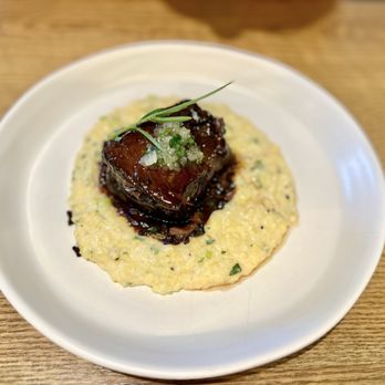Restaurant Constance signature dishes Braised Beef Short Rib Au Poivre
Rock Shrimp & Grits
Smoked Chicken Tacos